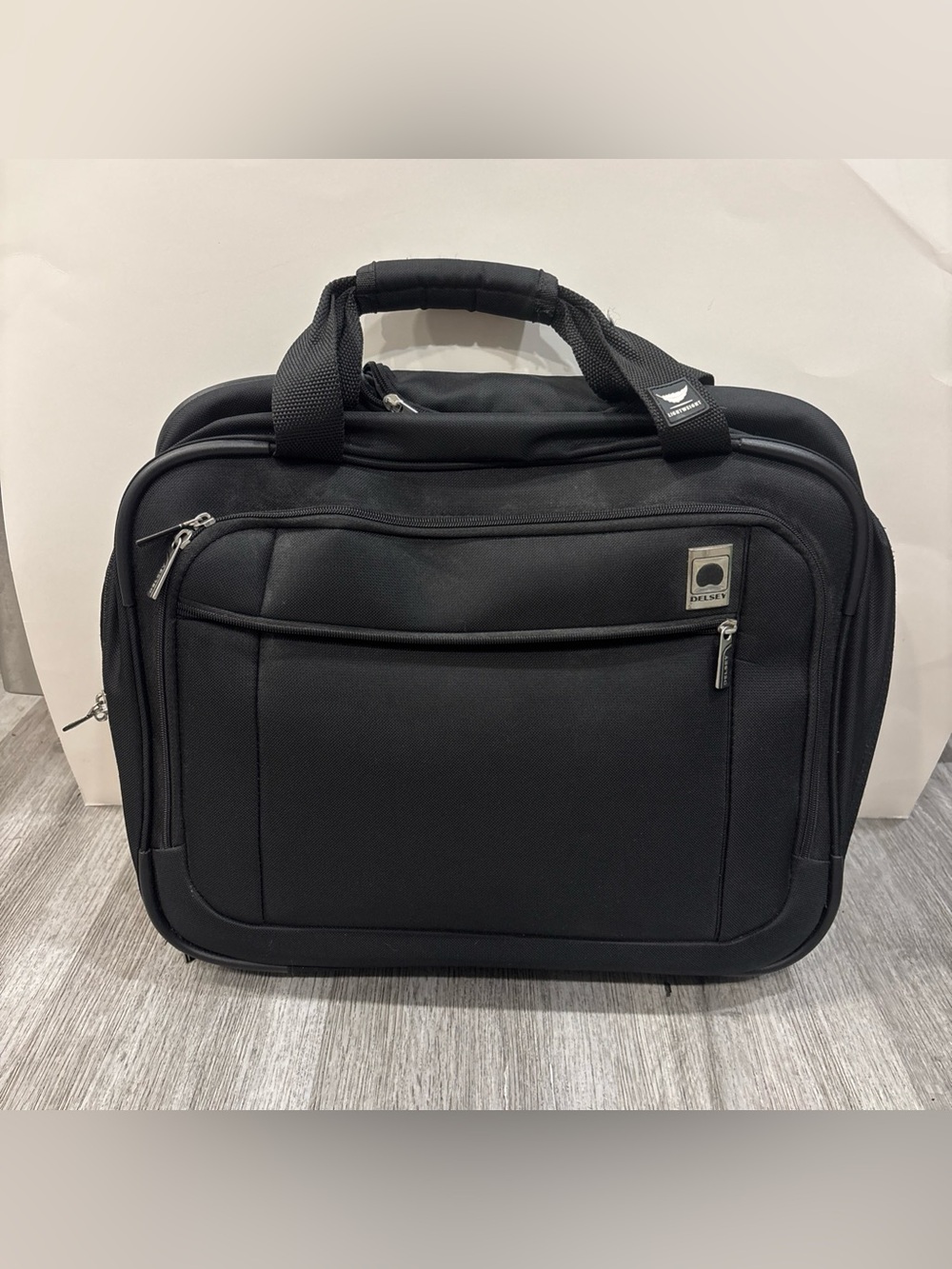 Delsey Paris black travel carryon with wheels luggage suitcase travel